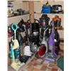 Image 1 : LARGE CORNER LOT OF ASSORTED VACUUME CLEANERS;