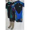 Image 1 : 2 RACKS OF ASSORTED SIZE WETSUITS *MUST TAKE ALL*
