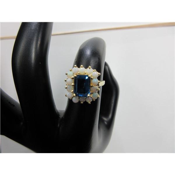 Lady's 14K Gold Ring with Blue Tanzanite Gem & 14 Opals.