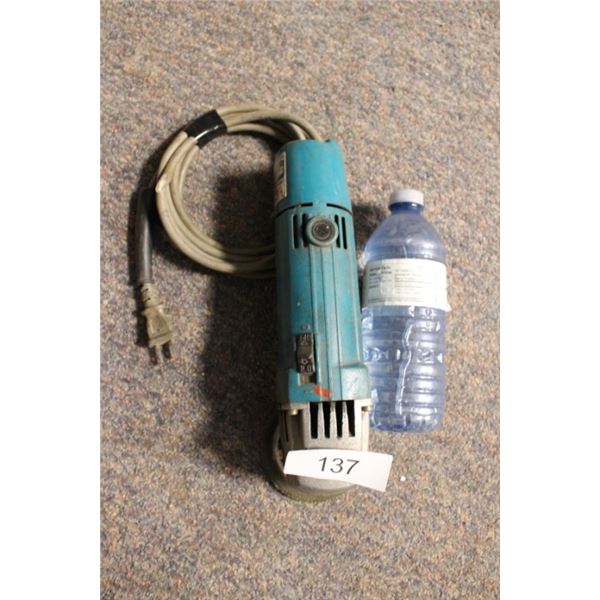 Makita grinder works