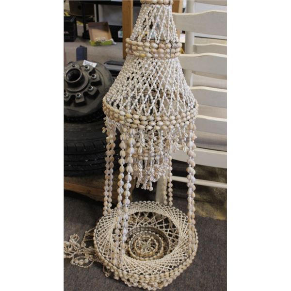 Shell hanging plant holder