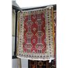 Image 1 : 100% hand made Iranian throw carpet with red background and overall geometric pattern in colours of 