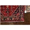 Image 2 : 100% hand made Iranian wool carpet "Hamdan" with center medallion, red background and highlights of 