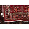 Image 2 : 100% hand made Iranian wool carpet "Kurdish" with red background, geometric design and highlights of