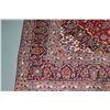 Image 2 : 100% hand made Iranian wool carpet "Kashan" with center medallion, floral design and red background,