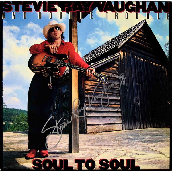 Stevie Ray Vaughan and Double Soul To Soul signed album