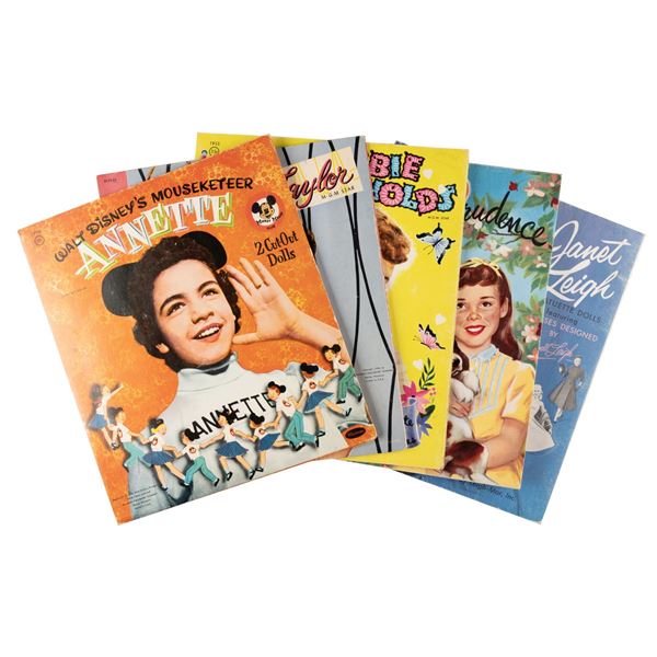 A Collection of 1950s Paper Doll Sets.