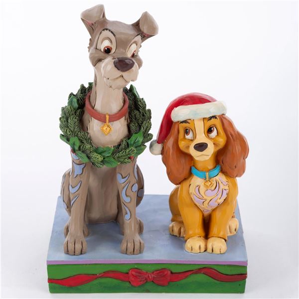 A Disney Traditions "Decked Out Dogs" Figurine.