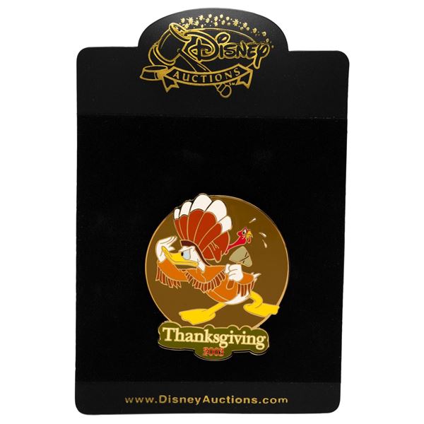 A Disney Auctions Donald Duck Thanksgiving Pin.