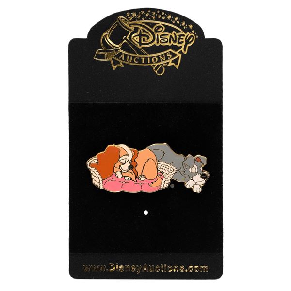 A Disney Auctions Lady and Tramp Sleeping Pin.