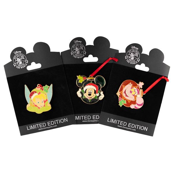 A Collection of Disney Shopping Holiday Ornament Pins.