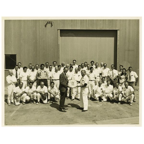 A Maintenance & Engineering Cast Member Group Photo.