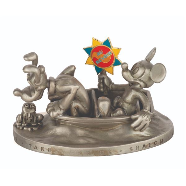 An It's a Small World Mickey Pewter Figure with Pin.