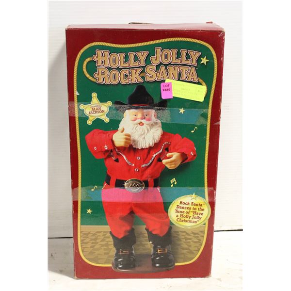 VINTAGE HOLLY JOLLY ROCK SANTA. SINGS ALAN JACKSON