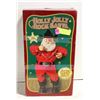 Image 1 : VINTAGE HOLLY JOLLY ROCK SANTA. SINGS ALAN JACKSON