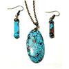 Image 1 : 27)  ELONGATED OVAL 34 CT MAGNESITE TURQUOISE