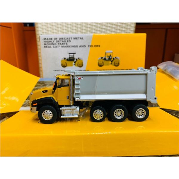 NEW CAT DAY CAB TRACTOR WITH OX STAMPEDE DUMP TRUC
