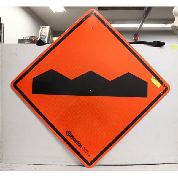 BUMPY ROAD AHEAD SIGN