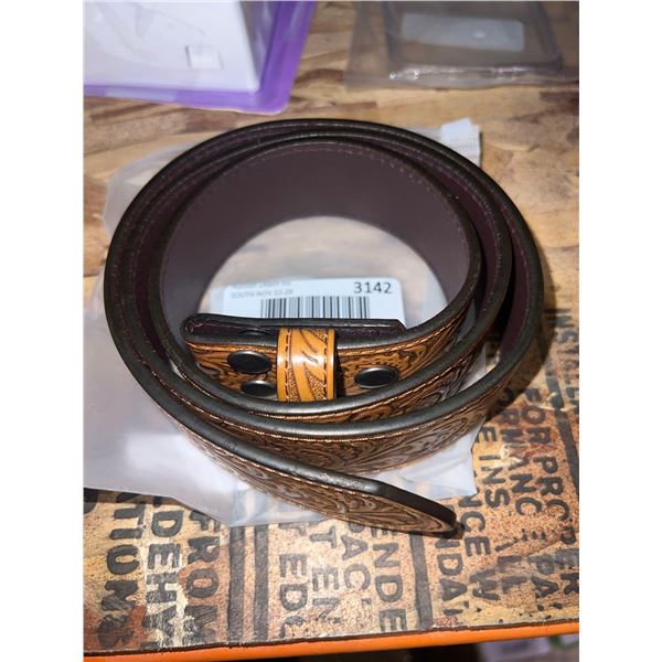 Light brown belt with a neat design, unknown size