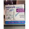 Image 2 : Waterpik Waterflosser Ultra Plus Water Flosser & Cordless Pearl Water Flosser - 5 Accessory tips, US