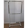 Image 1 : ADJUSTABLE HEIGHT GARMENT RACK ON WHEELS