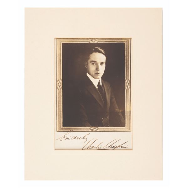 A Charlie Chaplin Signed Photo.