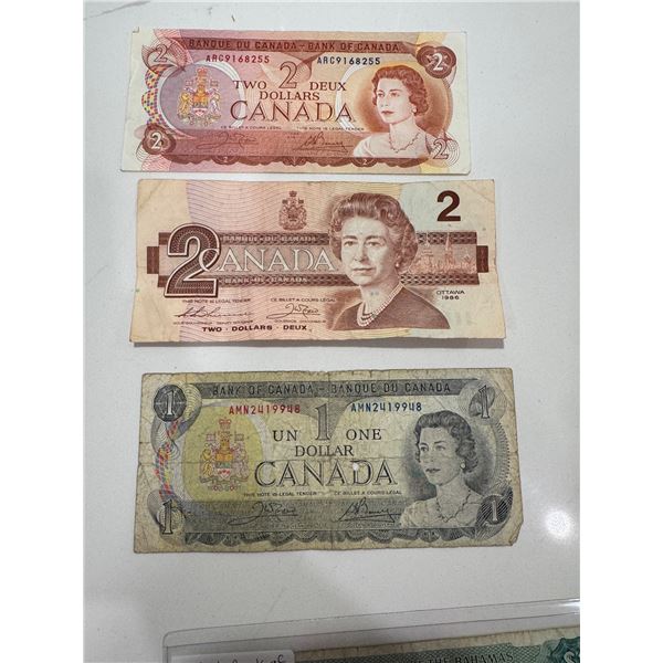 1974 $2 bill  1986 $2 bill  1973 $1 bill  Canadian