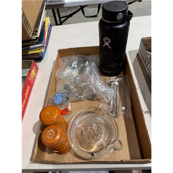 Assorted salt and pepper, shakers, glass, juicer, thermometers, etc.