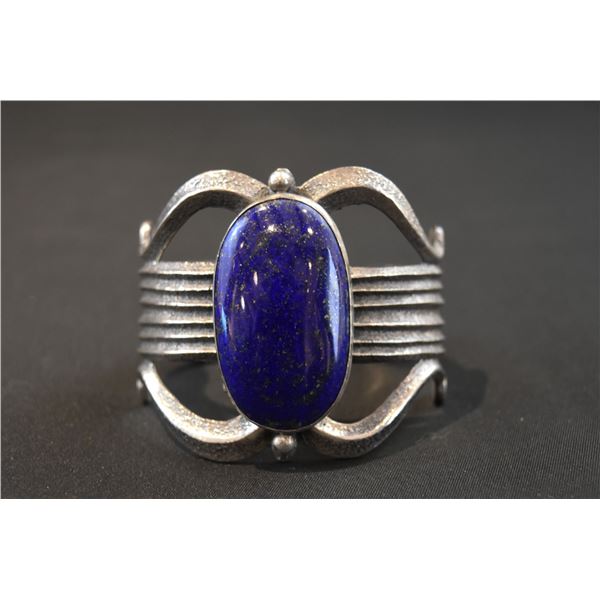 Navajo Large Oval Lapis Lazuli gemstone with silver flecks and Sandcast Bracelet by Gary S Custer
