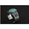 Image 4 : Large Oval Matrix Kingman Turquoise with twisted silver bracelet by Steven Arviso