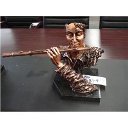 Flute Player Statue