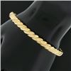 Image 1 : 14K Yellow Gold 6.5" 5.6mm Dual Finish Twisted Hinged Open Stack Bangle Bracelet
