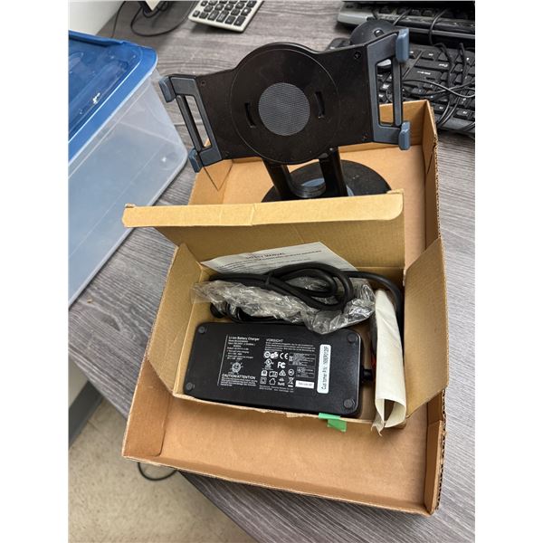 Battery charger, and tablet stand