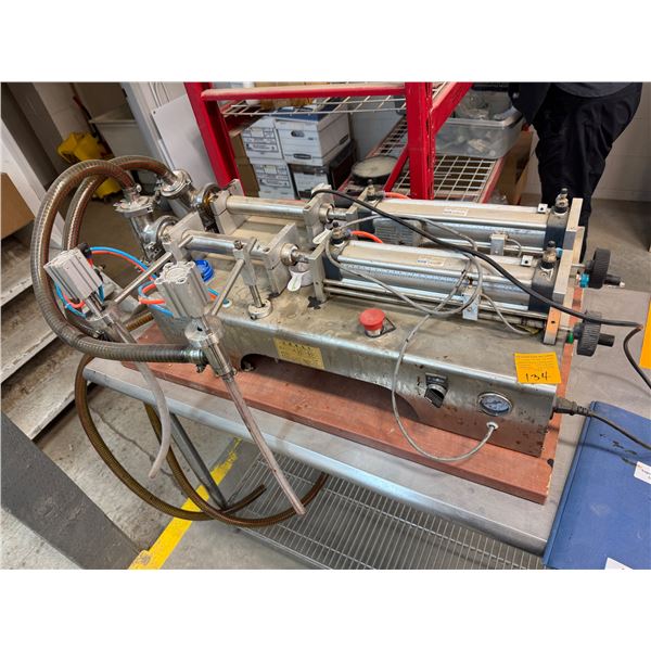 Liquid filling machine for organic booster