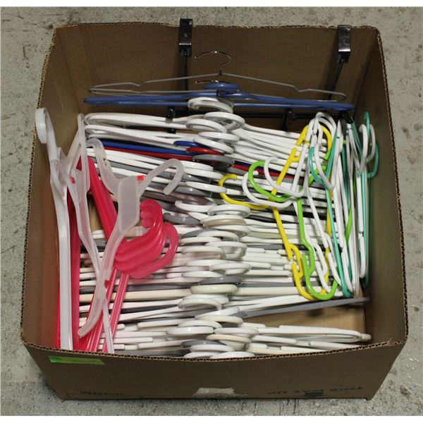 BOX WITH OVER 70 PLASTIC HANGERS AND METAL