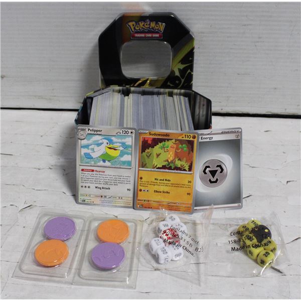 TIN MISC. POKEMON CARDS/DICE/COIN