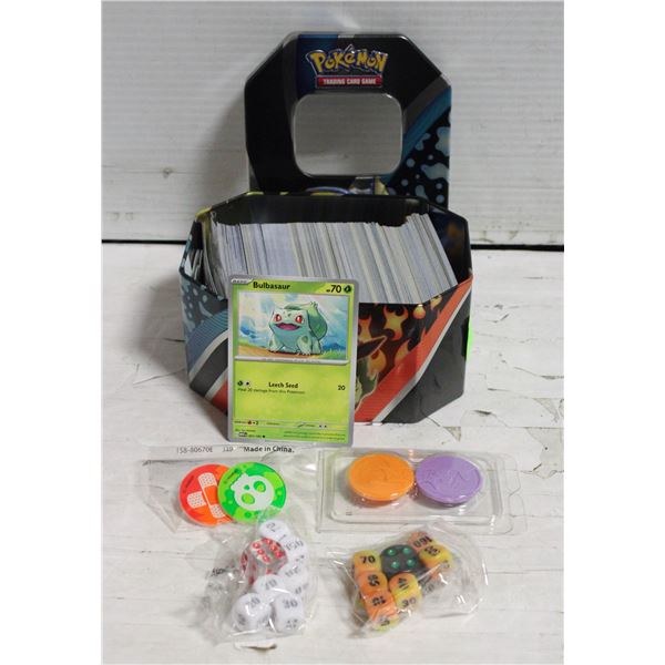 TIN MISC. POKEMON CARDS/DICE/COIN