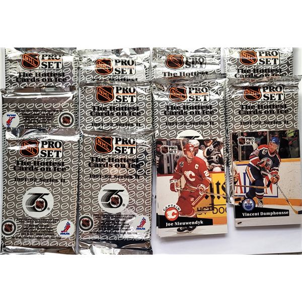 16) LOT OF 10 PACKAGES OF 15 NHL TRADING CARDS