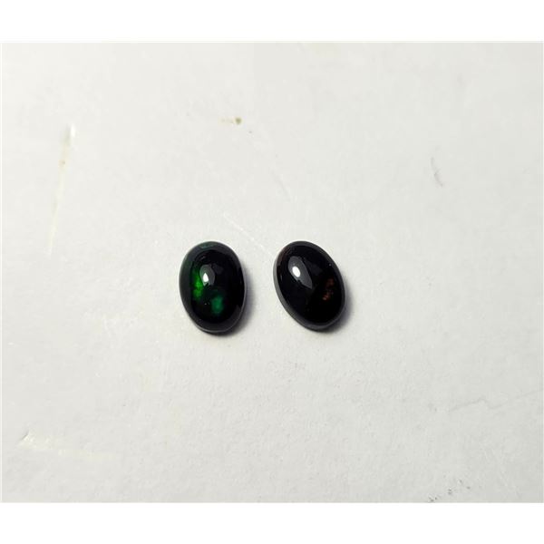 19) LOT OF 2 MATCHED BLACK OPAL GEMSTONES,