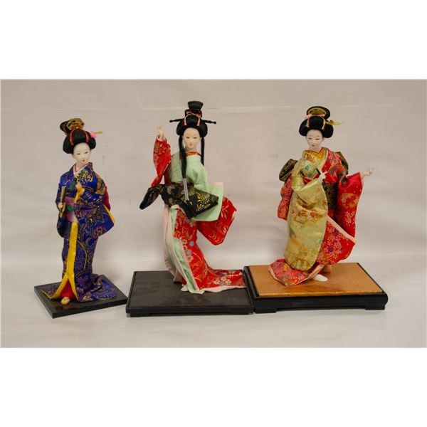 LOT OF THREE 8" GEISHA PORCELAIN FIGURINES