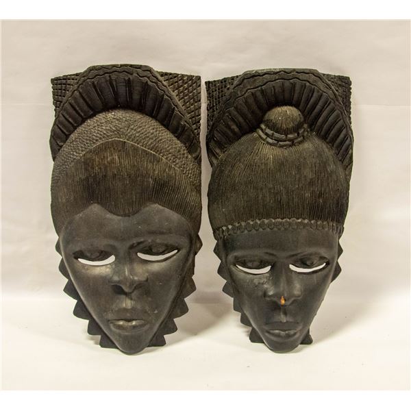 PAIR OF HAND CARVED WOODEN MASKS