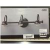 Image 3 : Style Selections 3-Light 5.75 Bronze Vanity light bar- Dimensions: 20-in L x 6-in H