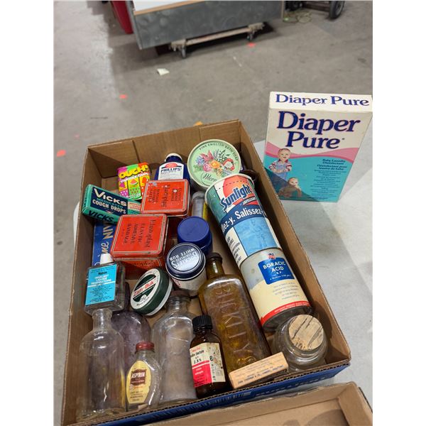 Vintage advertising tins and bottles