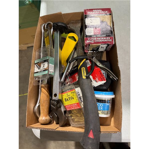 Assorted tools and framing nails