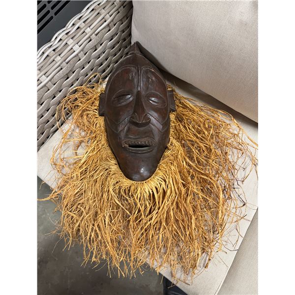 Curved African tribal mask