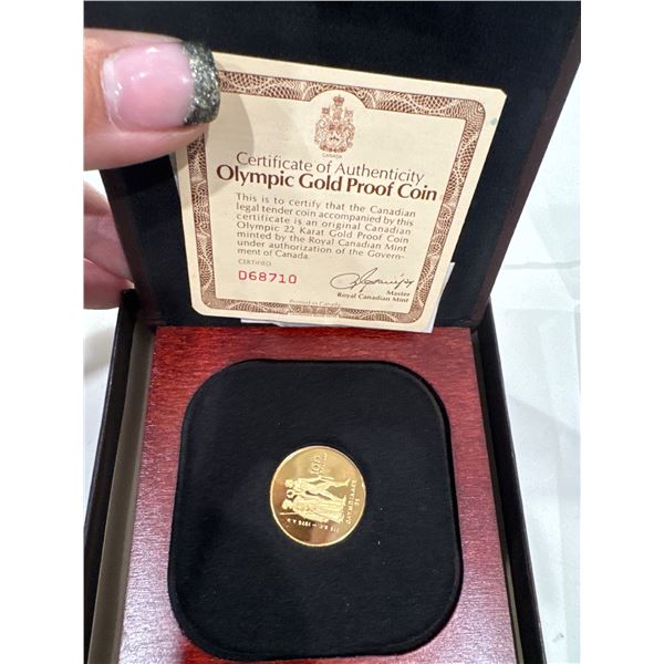 Olympic gold proof coined 22 karat $100 coin 776 B.C. 1976 A.D.