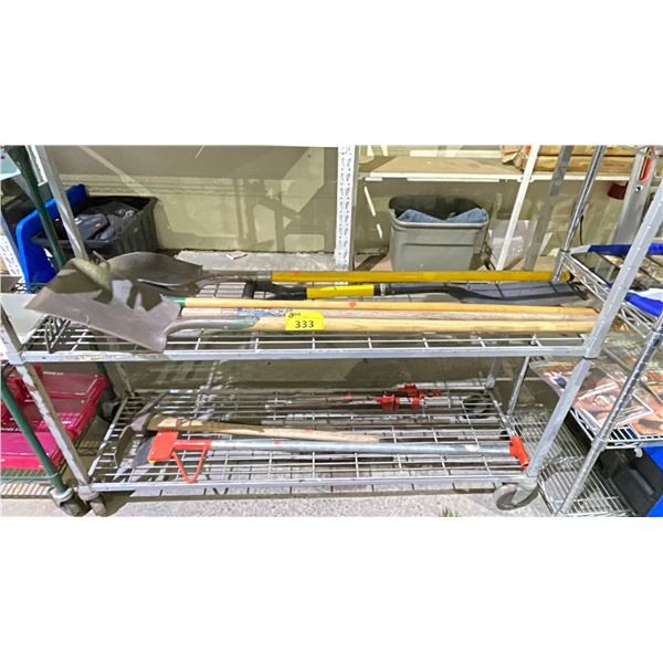 2 SHELVES OF ASSORTED GARDEN & SHOP TOOLS INCLUDING; SHOVELS, BAR CLAMPS, PICKAXE & MORE