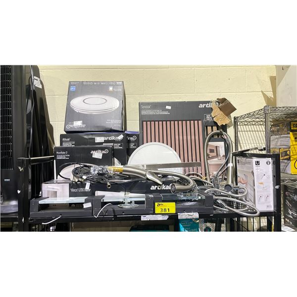 SHELF OF ASSORTED ITEMS INCLUDING; ARTIKA LIGHTING, KITCHEN & SHOWER FAUCETS, SOAP DISPENSER & MORE