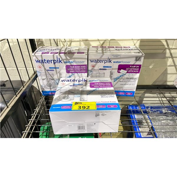 LOT OF ASSORTED WATERPIK WATERFLOSSERS (UNKNOWN WORKING CONDITION, MAY BE MISSING PIECES)