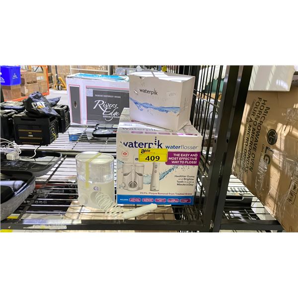 LOT OF ASSORTED WATERPIK WATERFLOSSERS (UNKNOWN WORKING CONDITION, MAY BE MISSING PIECES)